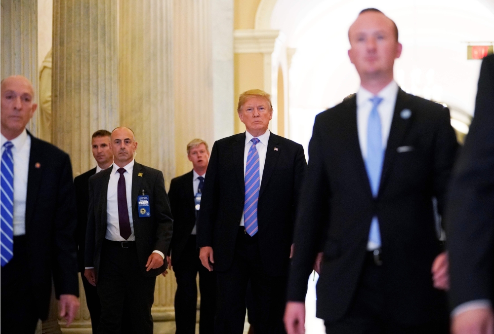 US President Donald Trump departs the US Capitol after addressing the House Republican Conference in Washington, D.C., on Tuesday. — AFP