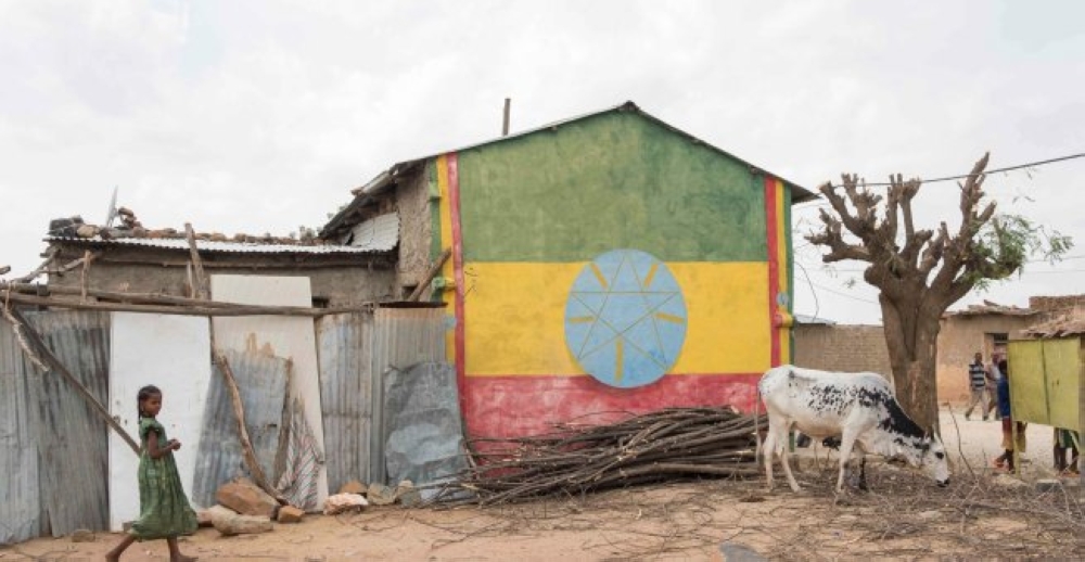 In Badme, a disputed town on the border between Ethiopia and Eritrea, the local police station is painted in the colors of the Ethiopian flag. — Courtesy photo