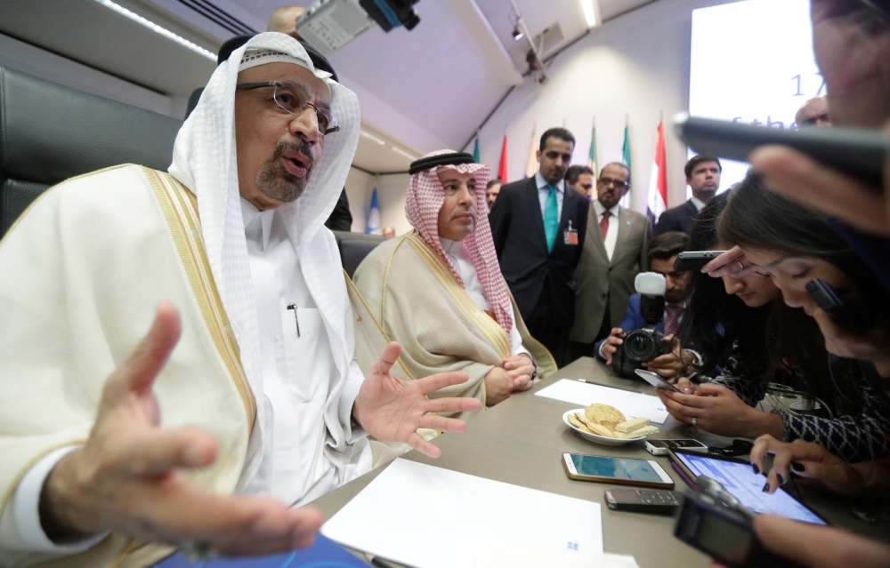 Minister of Energy, Industry and Mineral Resources Khalid Al-Falih talks to journalists at the beginning of an OPEC meeting in Vienna, Austria, on Friday. — Reuters