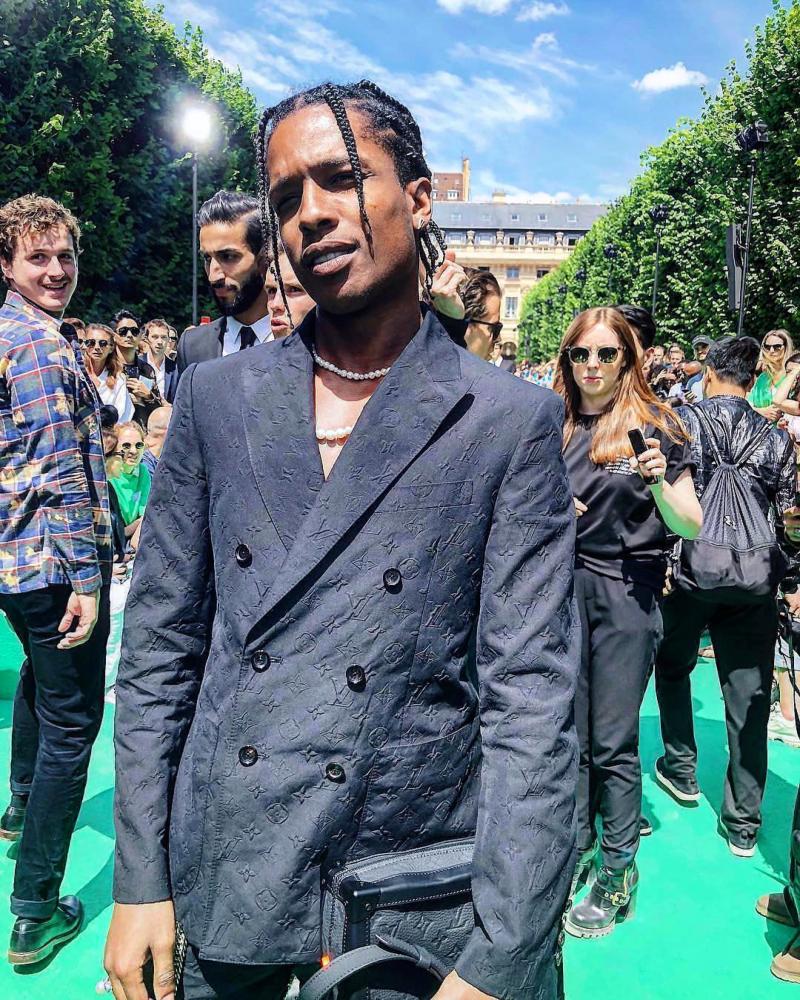ASAP Rocky at Virgil Abloh’s debut for Parisian fashion house Louis Vuitton. Dress in a full LV outfit.
