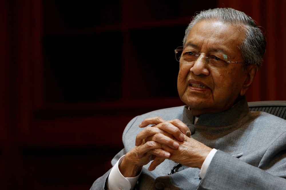 Malaysia’s Prime Minister Mahathir Mohamad speaks during an interview in Putrajaya, Malaysia, in this June 19, 2018 file photo. — Reuters