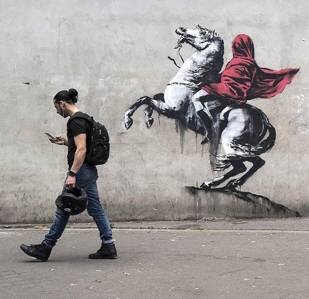 Art news — Banksy confirms authorship of  provocative Paris mural blitz