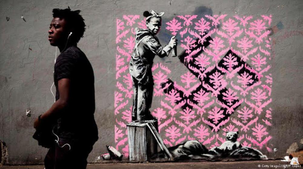Art news — Banksy confirms authorship of  provocative Paris mural blitz