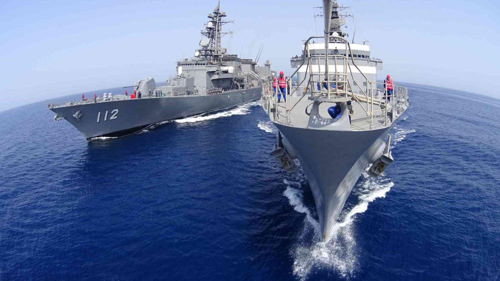Rear Adm. Hiroyuki Izumi receives visitors aboard the Japanese destroyer ‘Makinami’ at Jeddah Islamic Port on Saturday.