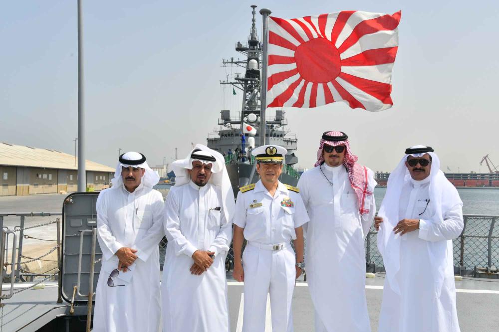 Rear Adm. Hiroyuki Izumi receives visitors aboard the Japanese destroyer ‘Makinami’ at Jeddah Islamic Port on Saturday.
