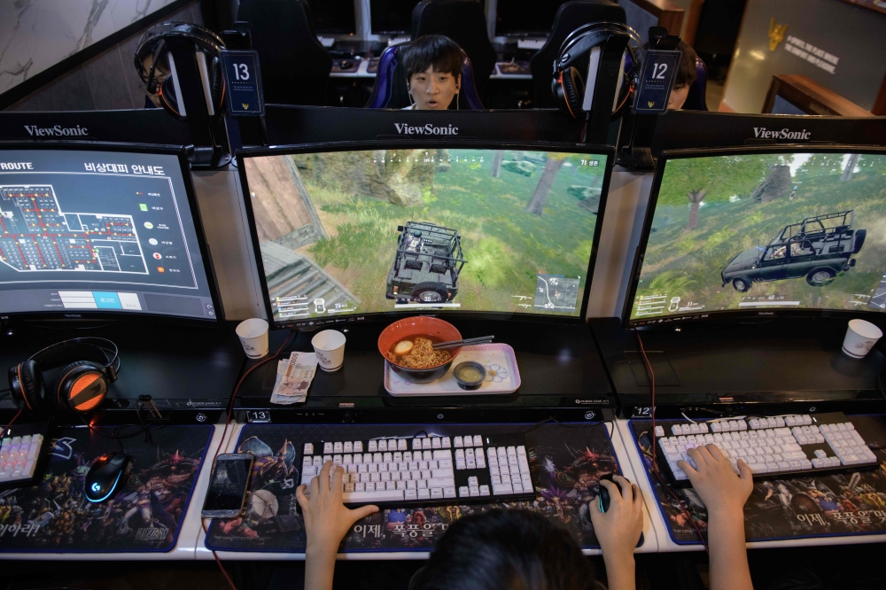 Members of professional eSports team Griffin prepare to compete in a League of Legends competition in Seoul. - AFP