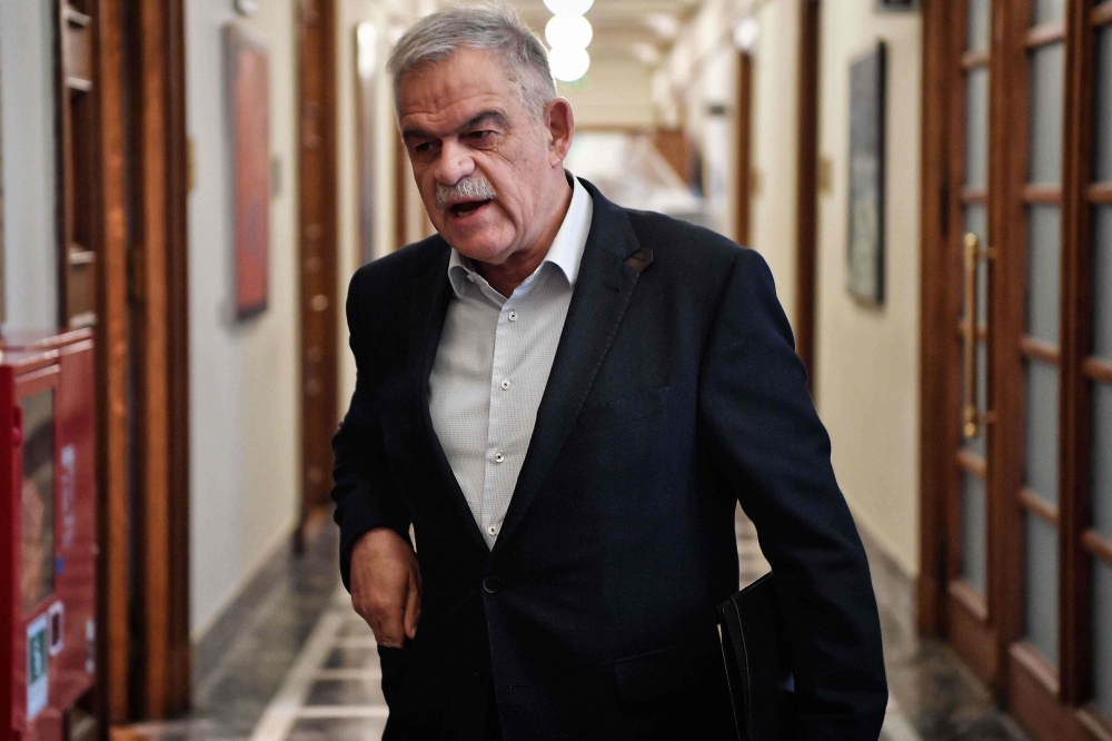 Greece’s minister responsible for the police, Nikos Toskas arrives for a Cabinet meeting at the Greek parliament in Athens in this April 3, 2018 file photo. — AFP