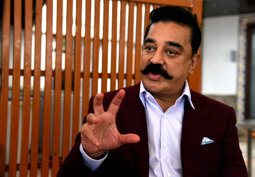 Indian Bollywood film actor, director, screenwriter, and producer Kamal Haasan speaks during an interview for the promotion of his upcoming Hindi and Tamil film Vishwaroopam 2 in Mumbai in this July 31, 2018 file photo. — AFP