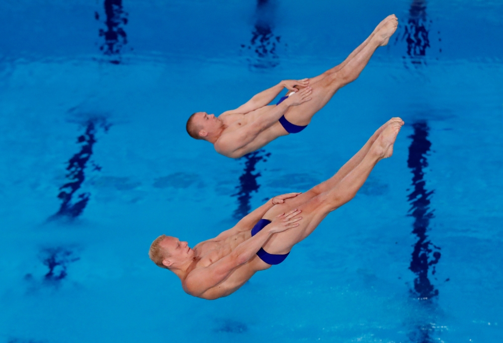 Evgenii Kuznetsov and Ilia Zakharov of Russia in action during the 2018 European Championships Diving, Men's Synchronized 3m Springboard Final at the Royal Commonwealth Pool, Edinburgh, Britain, on Friday. — Reuters