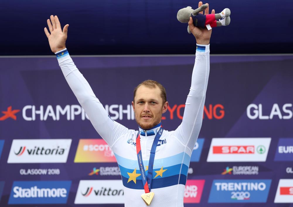 Gold medalist Matteo Trentin of Italy celebrates on the podium of the European Cycling Championships in Glasgow Sunday. — Reuters