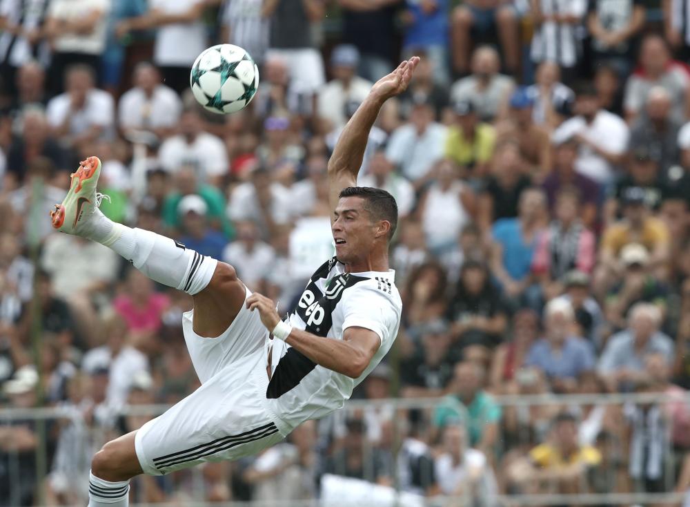Juventus' forward Cristiano Ronaldo kicks the ball during a friendly football match between Juventus A and Juventus B at Villar Perosa, Italy, Sunday. — AFP