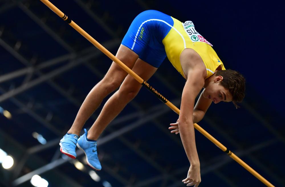 Sweden’s Armand Duplantis competes to win the men’s pole vault final of the European Athletics Championships at the Olympic Stadium in Berlin Sunday. — AFP 