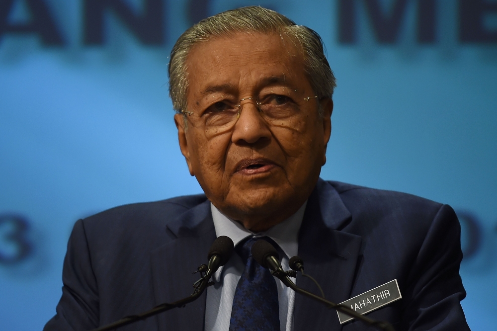 Malaysia's Prime Mininster Mahathir Mohamad addresses a press conference at the prime minister’s office in Putrajaya on Monday. — AFP