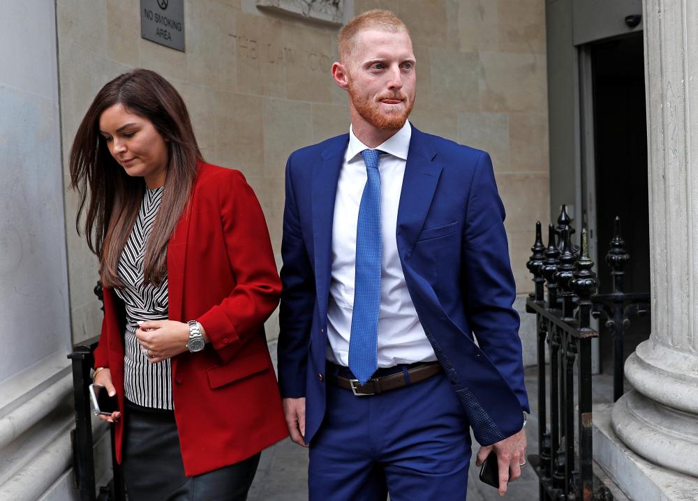 England cricket player Ben Stokes and his wife Clare Ratcliffe leave Bristol Crown Court in Bristol Thursday. — Reuters