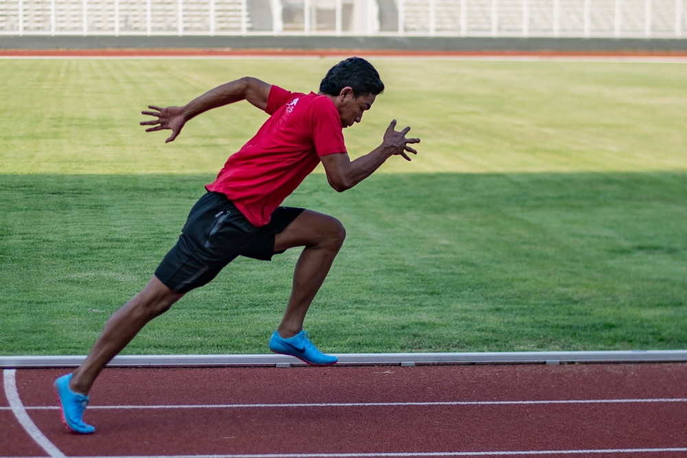 This photo shows Indonesian sprinter Lalu Zohri practicing at the Senayan sport complex in Jakarta, ahead of the 2018 Asian Games. Rags-to-riches teenage sprinter Lalu Zohri has given Indonesia an unexpected confidence boost as the Asian Games hosts look to pull off their first top-10 medals finish in decades. — AFP