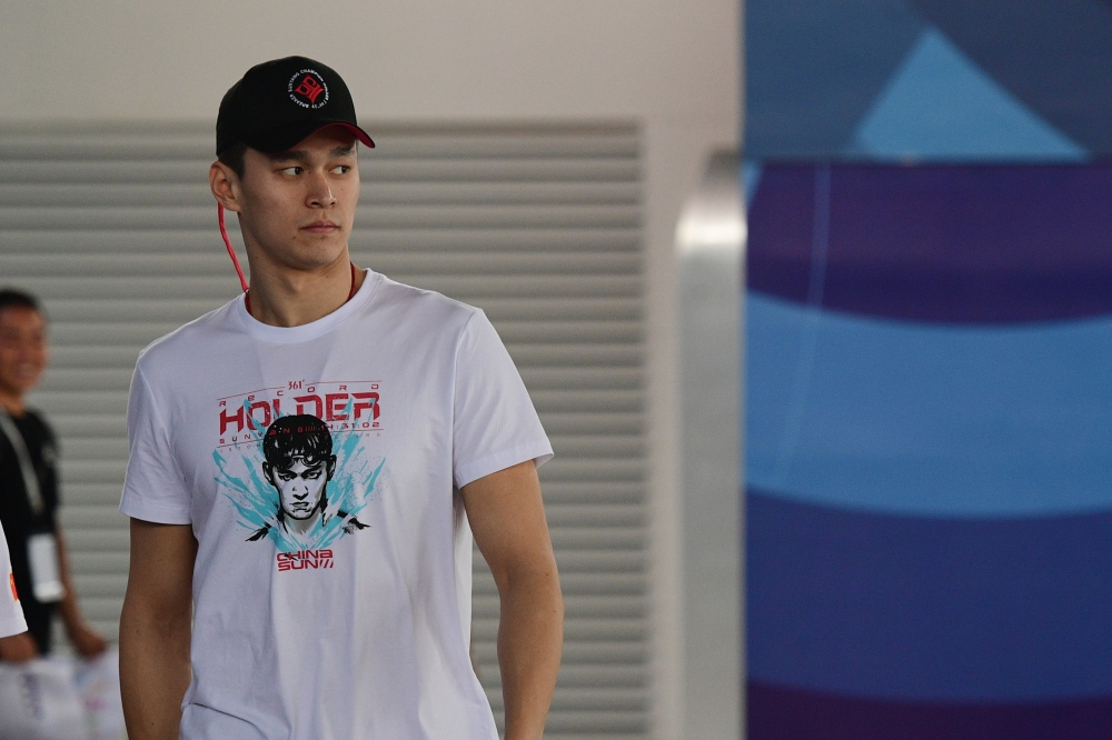 China's swimmer Sun Yang leaves the swimming pool after a training session at the Aquatics center during the 2018 Asian Games in Jakarta on Thursday — AFP
