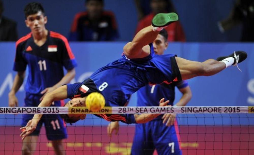 A file photo of sepaktakraw players in action during the SEA Games. — Reuters