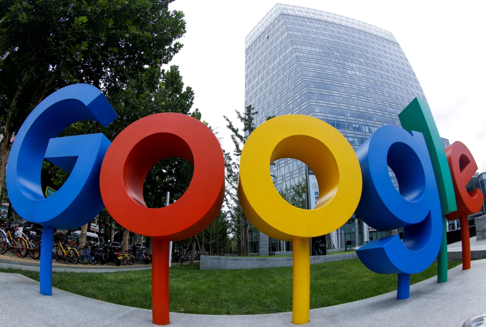 The brand logo of Alphabet Inc's Google is seen outside its office in Beijing, China.  Picture taken with a fisheye lens. — Reuters