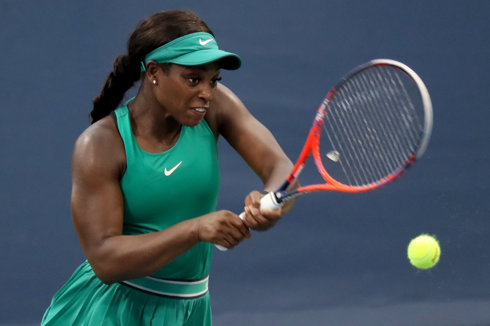 Sloane Stephens of the United States returns a shot to Elise Mertens of Belgium during Day 6 of the Western and Southern Open at the Lindner Family Tennis Center on Thursday in Mason, Ohio. — AFP