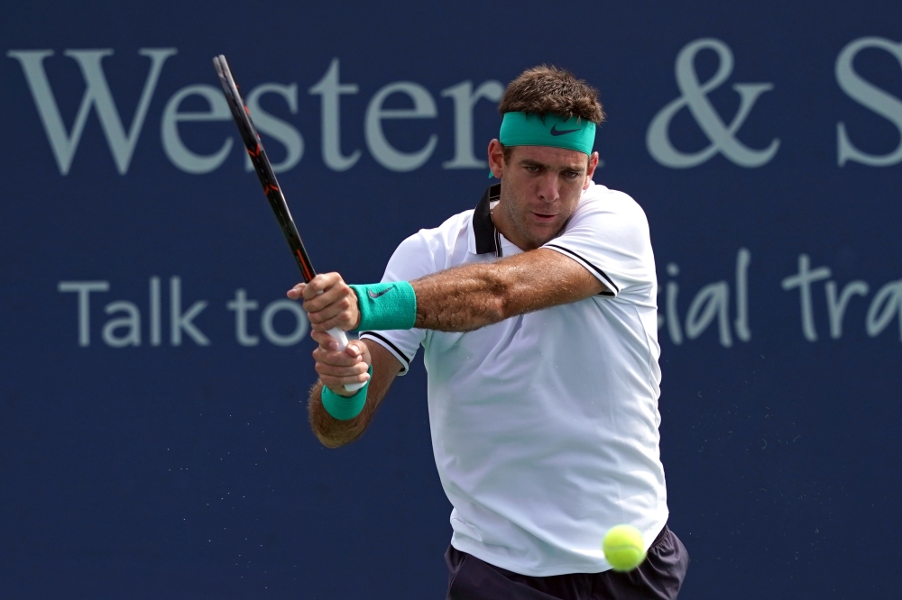 Argentine Juan Martin del Potro returns a shot against Korean Chung Hyeon in the Western and Southern tennis open at Lindner Family Tennis Center. — Reuters