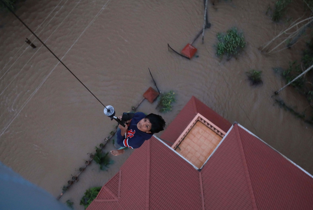 View of a flooded area is pictured in the north part of Kochi in the Indian state of Kerala on Saturday. — AFP