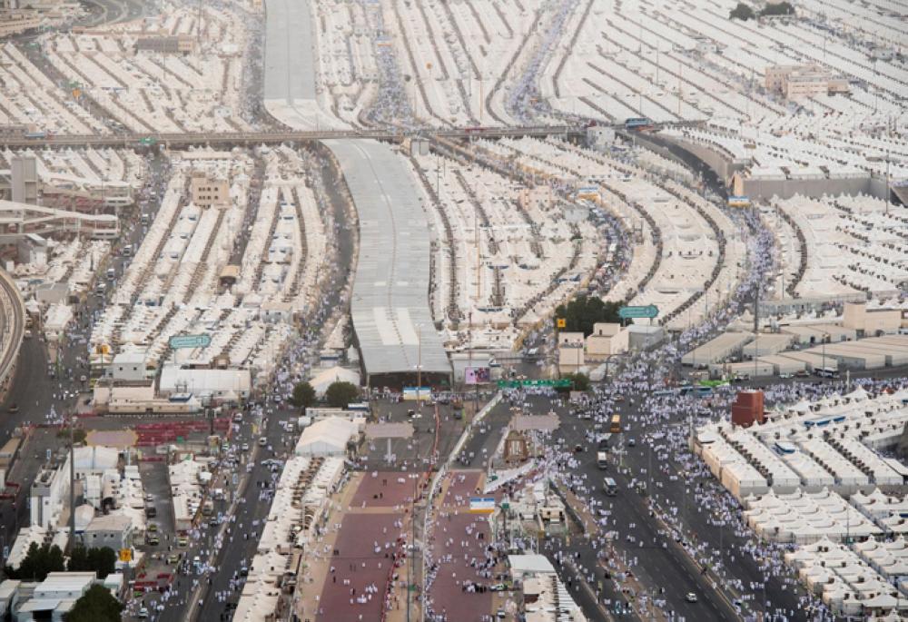 White sea of humanity surge to Arafat at climax of Haj