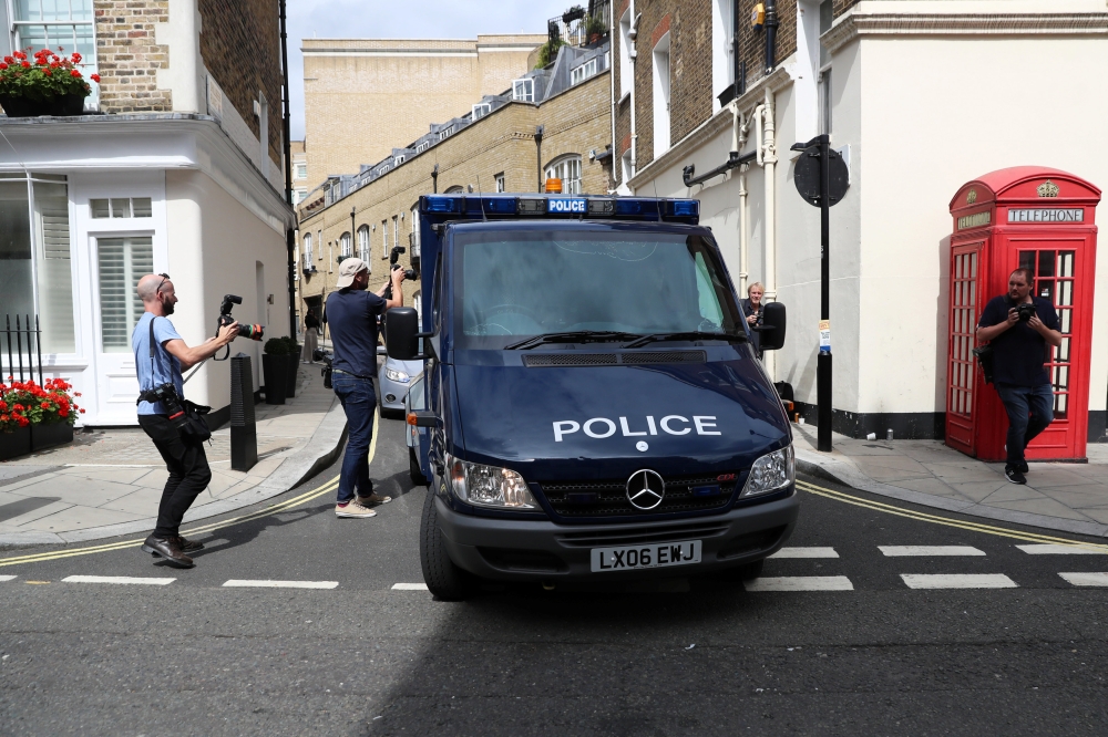 A police van, believed to be carrying Sudanese-born British national Salih Khater, leaves Westminster Magistrates’ Court in London on Monday. — Reuters