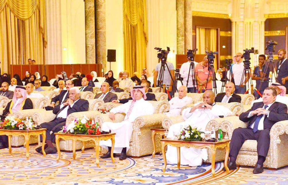 Minister of Media Dr. Awwad Al-Awwad (left) with Pakistani actor Fawad Khan, who performed Haj, at the Ministry of Media event. — SPA