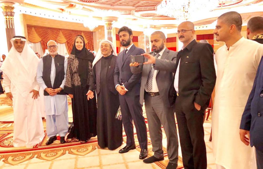 Minister of Media Dr. Awwad Al-Awwad (left) with Pakistani actor Fawad Khan, who performed Haj, at the Ministry of Media event. — SPA
