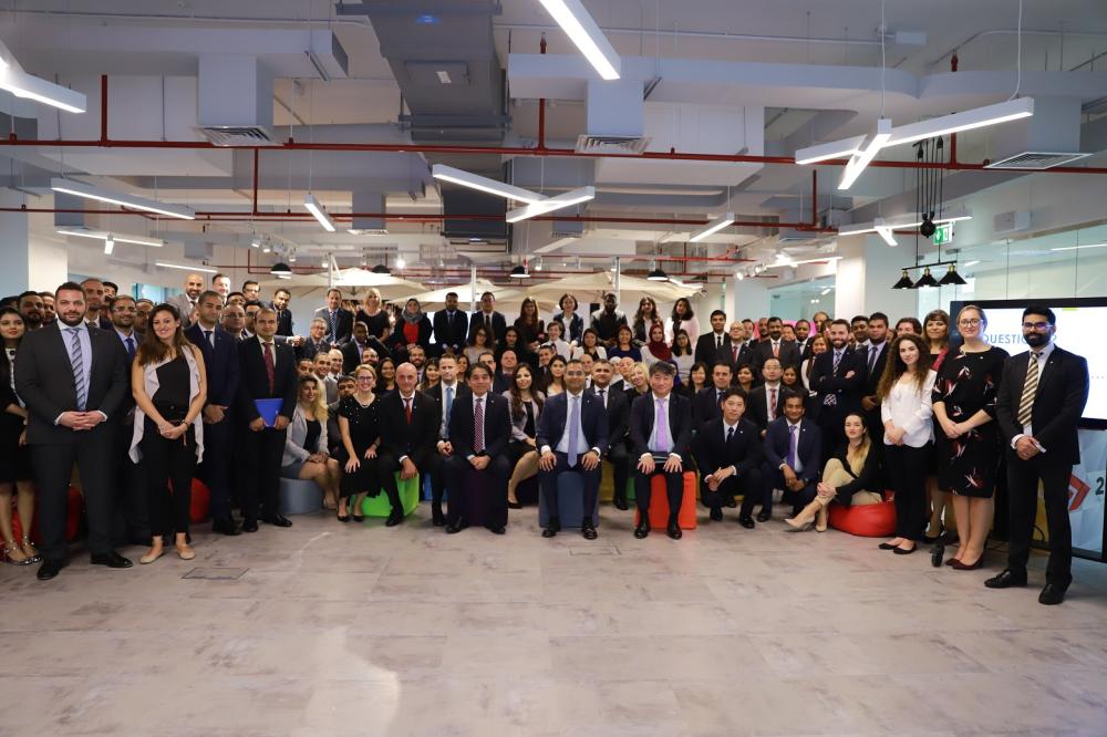 Newly appointed Canon EMEA President & CEO Yuichi Ishizuka (front row, seated, first from left), poses with officers and employees during his visit to Canon's regional headquarters