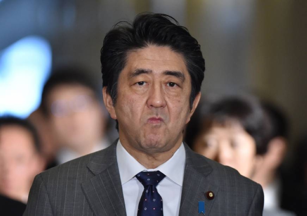 Japanese Prime Minister Shinzo Abe, seen in this file photo, said any summit he holds with North Korea's Kim Jong Un must tackle abducted citizens
