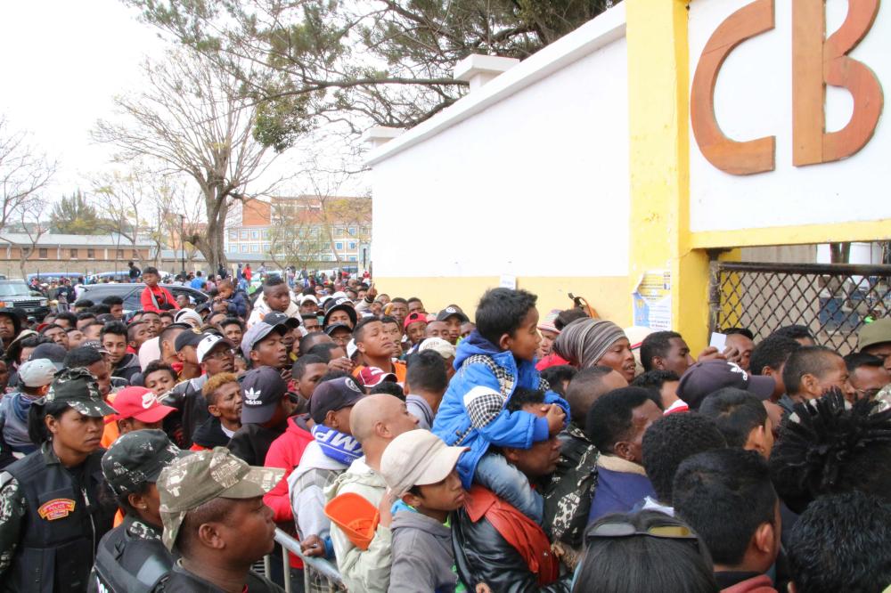 Malagasy people queue outside a football stadium waiting to enter and attend the African Cup of Nations qualifier match between Senegal and Madagascar in Antananarivo, Madagascar. — AFP