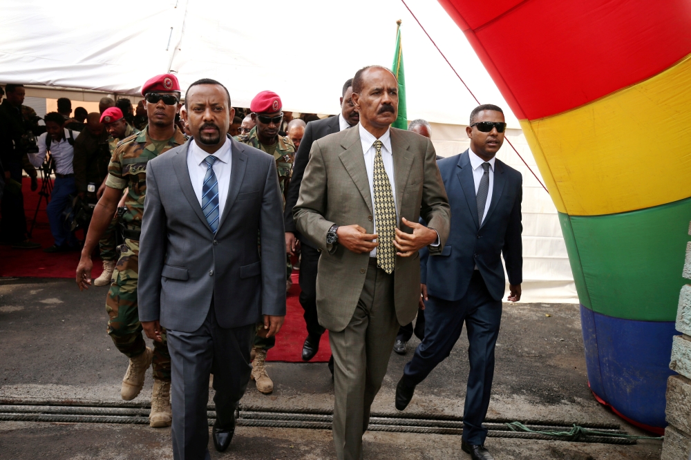 Eritrea’s President Isaias Afwerki and Ethiopia’s Prime Minister, Abiy Ahmed arrive for an inauguration ceremony marking the reopening of the Eritrean embassy in Addis Ababa, Ethiopia, in this July 16, 2018 file photo. — Reuters
