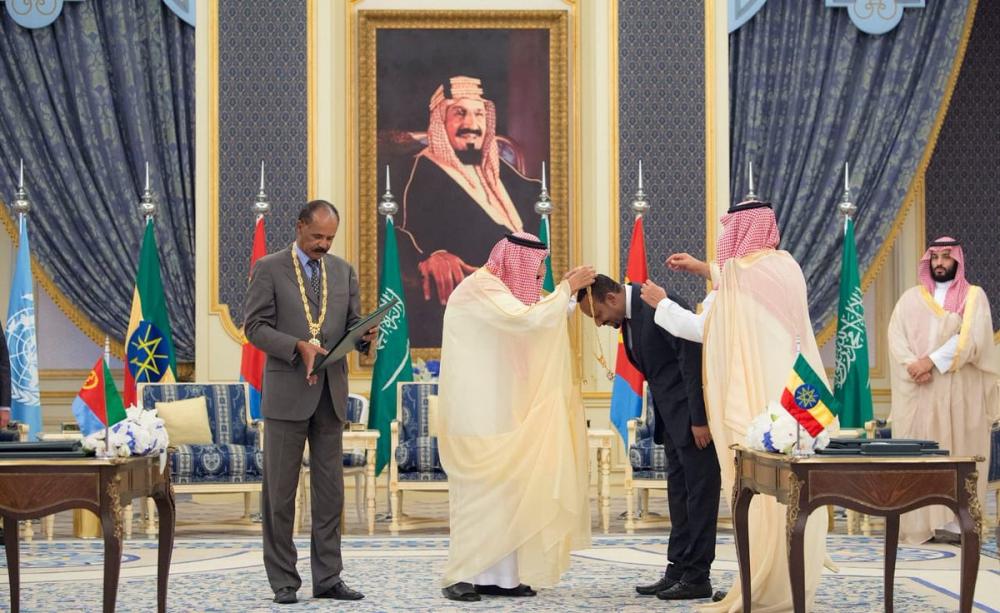 Custodian of the Two Holy Mosques King Salman, Eritrean President Isaias Afwerki (to the right of the King) and Ethiopian Prime Minister Abiy Ahmed Ali stand for a photo after the signing ceremony in Jeddah on Sunday. Crown Prince Muhammad Bin Salman, deputy premier and minister of defense, UN Secretary General Antonio Guterres and UAE Minister of Foreign and International Cooperation Sheikh Abdullah Bin Zayed Al-Nahayan are also seen in the photo. — SPA