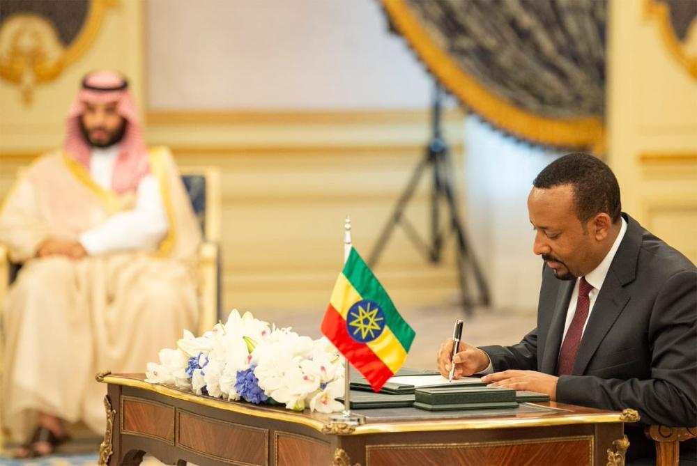 Custodian of the Two Holy Mosques King Salman, Eritrean President Isaias Afwerki (to the right of the King) and Ethiopian Prime Minister Abiy Ahmed Ali stand for a photo after the signing ceremony in Jeddah on Sunday. Crown Prince Muhammad Bin Salman, deputy premier and minister of defense, UN Secretary General Antonio Guterres and UAE Minister of Foreign and International Cooperation Sheikh Abdullah Bin Zayed Al-Nahayan are also seen in the photo. — SPA