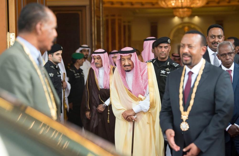 Custodian of the Two Holy Mosques King Salman, Eritrean President Isaias Afwerki (to the right of the King) and Ethiopian Prime Minister Abiy Ahmed Ali stand for a photo after the signing ceremony in Jeddah on Sunday. Crown Prince Muhammad Bin Salman, deputy premier and minister of defense, UN Secretary General Antonio Guterres and UAE Minister of Foreign and International Cooperation Sheikh Abdullah Bin Zayed Al-Nahayan are also seen in the photo. — SPA