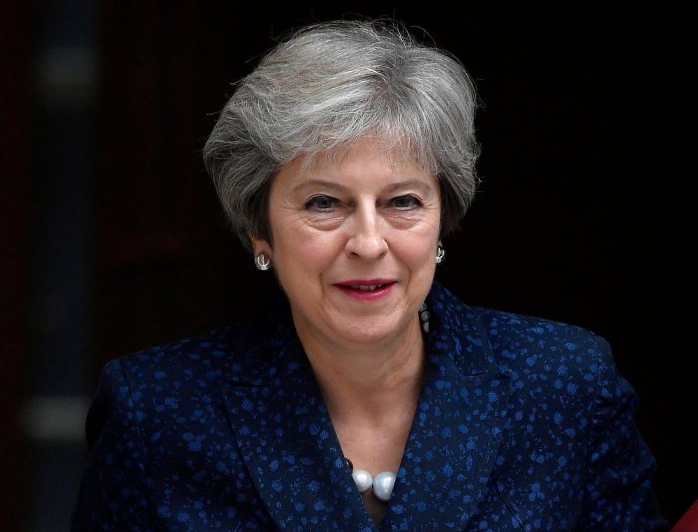 Britain’s Prime Minister Theresa May leaves 10 Downing Street in London in this Sept. 12, 2018 file photo. — Reuters