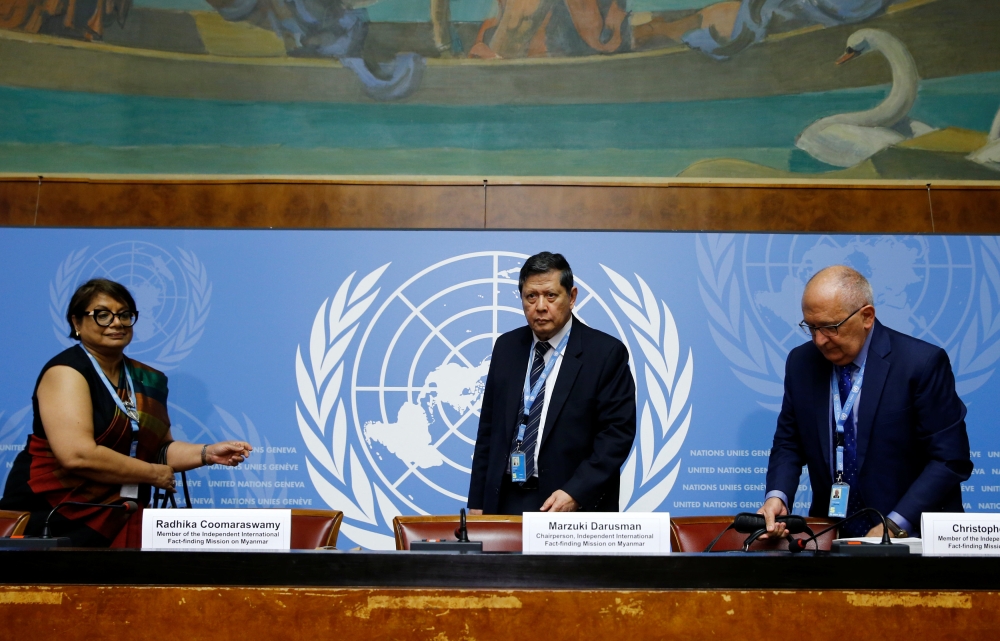Radhika Coomaraswamy, left, Marzuki Darusman, center, and Christopher Sidoti, members of the Independent International Fact-finding Mission on Myanmar, attend a news conference at the United Nations in Geneva, Switzerland, on Tuesday. — Reuters