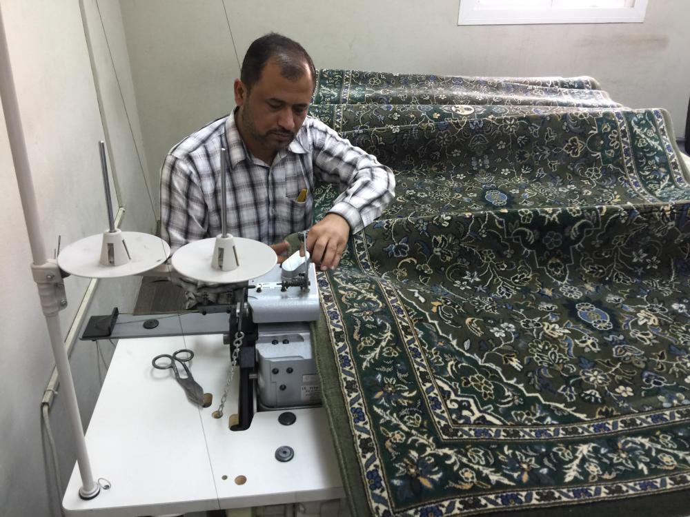 Cleaning prayer rugs a multi-phase mission in Makkah