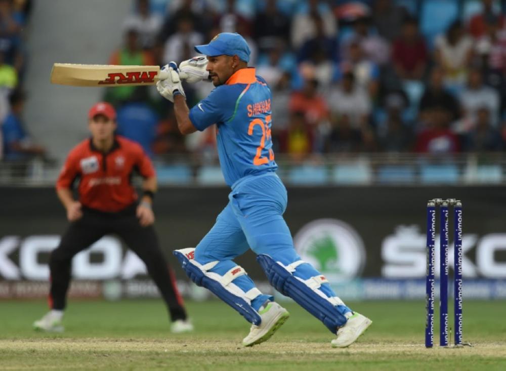 Shikhar Dhawan scored a hundred before India's bowlers dug them out of a hole as Hong Kong threatened an almighty upset. — AFP