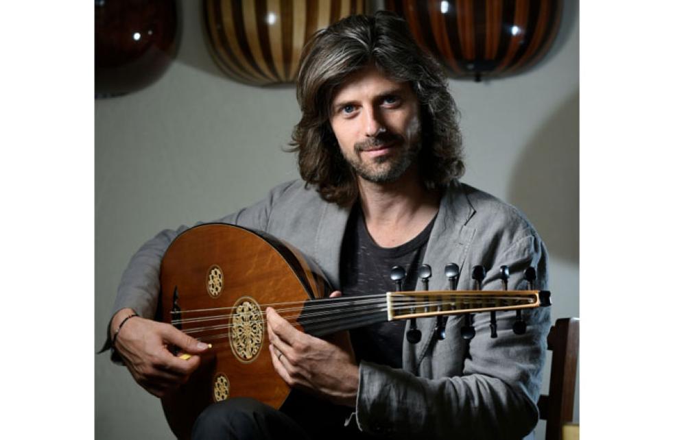 Belgian artistic director and oud player Tristan Driessens poses for a picture during an interview in Brussels. - AFP