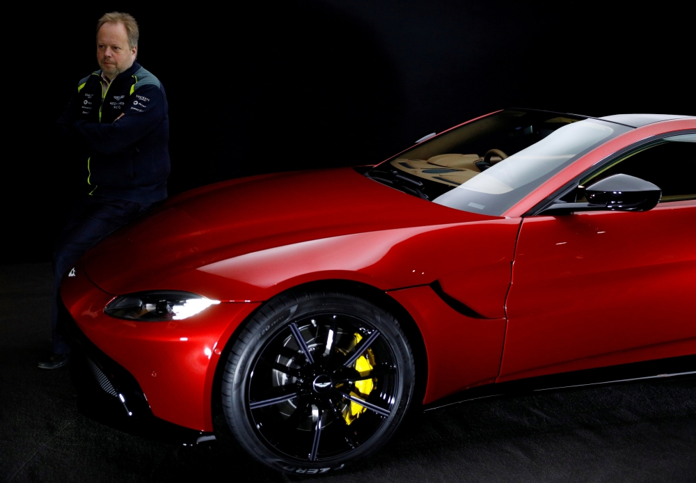 Andy Palmer, CEO of Aston Martin, poses for a photograph next to the company's new Vantage car in Gaydon, Britain, in this file photo. — Reuters