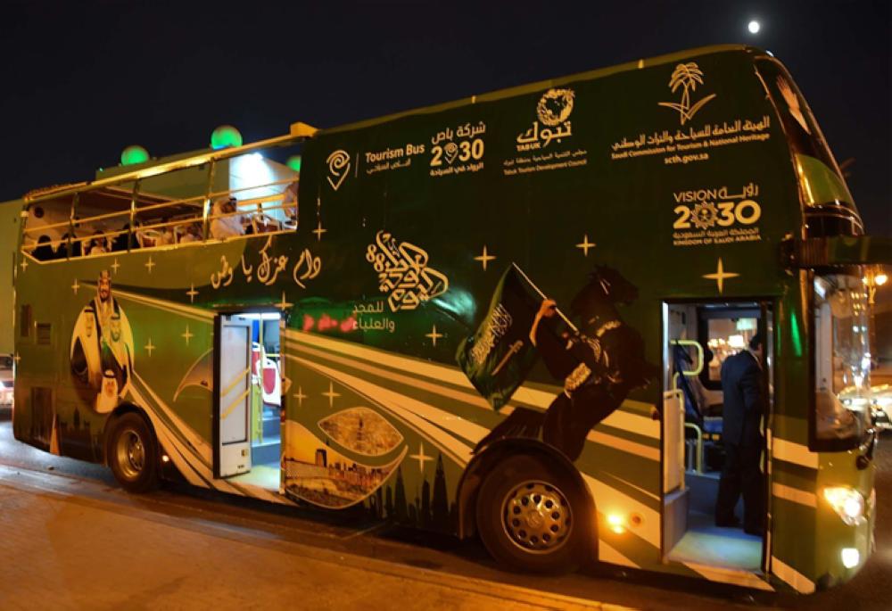  The tourist bus launched by the Saudi Commission for Tourism and National Heritage in Tabuk on the occasion of the National Day celebrations.