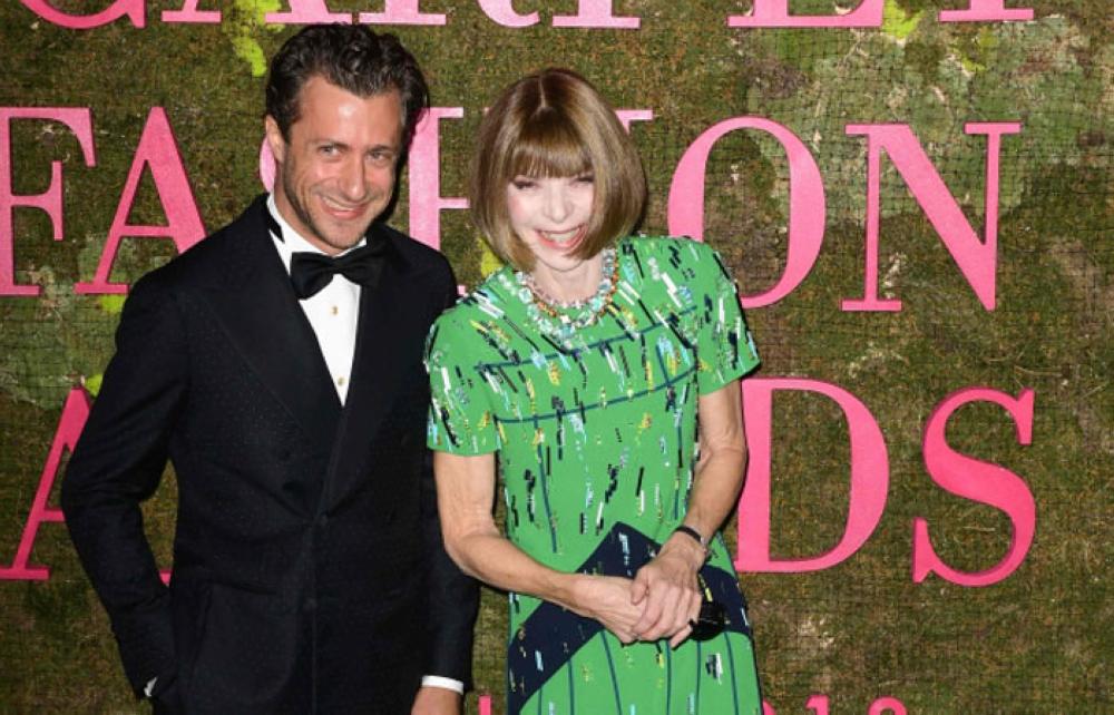 Vogue editor-in-chief Anna Wintour and Italian director and photographer Francesco Carrozzini pose as they arrive to attend the Green Carpet Fashion Awards on the sidelines of Women’s Spring/Summer 2019 fashion week in Milan on Monday. — AFP