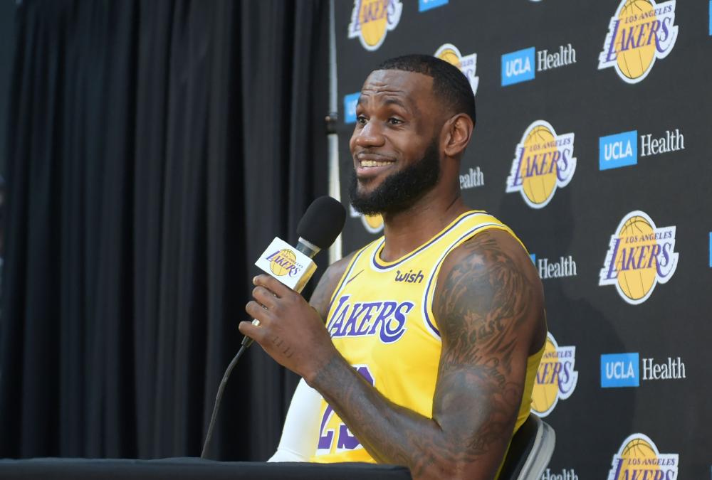 


LeBron James responds to questions at a press conference on the Los Angeles Lakers’ Media Day in Los Angeles Monday. The Lakers open their 2018 NBA season in Portland on Oct. 18. — AFP