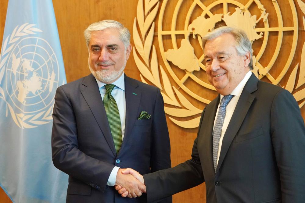 Abdullah Abdullah, left, Chief Executive of the Islamic Republic of Afghanistan, is greeted by United Nations Secretary-General Antَnio Guterres at UN headquarters in New York on Monday. — AFP