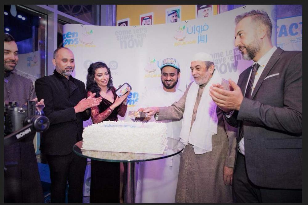 Dr. Syed Shah Khusro Al Hussaini, chairman and president of the Khaja Education Society, Gulbarga, Karnataka state, 2nd right, cuts cake during opening ceremony of Yummy Frozen Ribbons Shaved Ice Cream its first store in Dubai. — Courtesy photo
