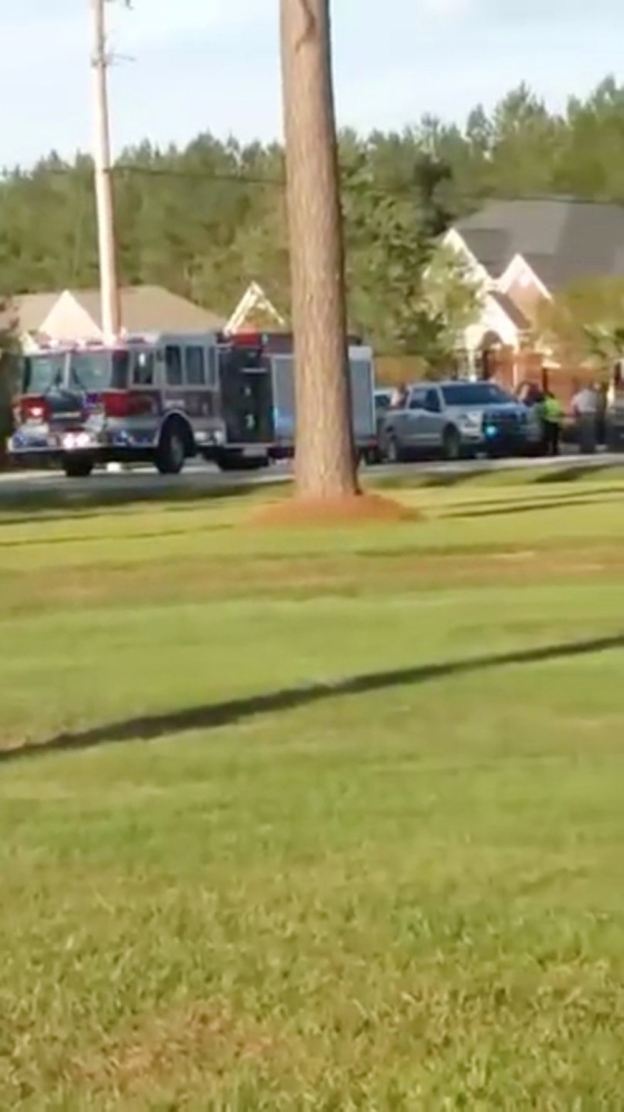 Emergency personnel are seen on site in the aftermath of a shooting in Florence, South Carolina, in this still image obtained from a social media video on Wednesday. — Reuters