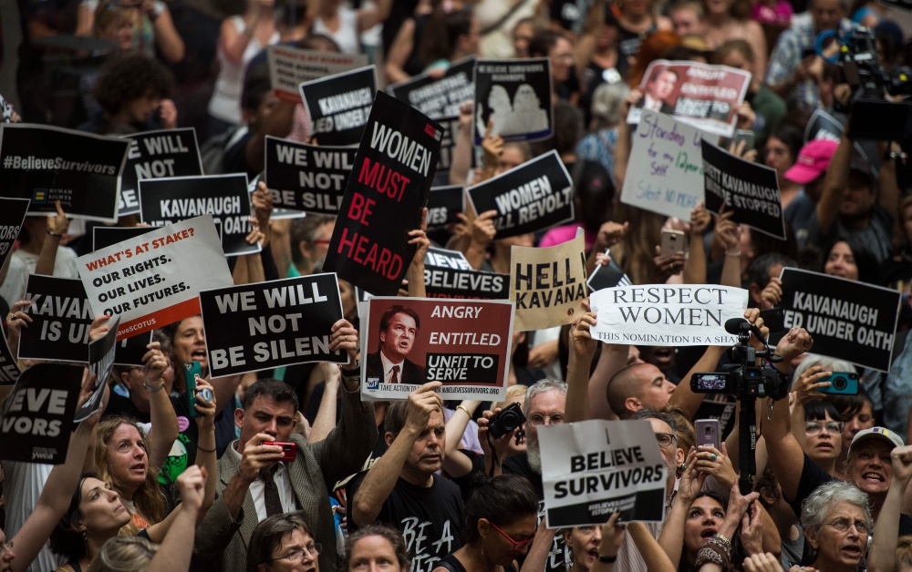Protesters occupy the Senate Hart building during a rally against Supreme Court nominee Brett Kavanaugh on Capitol Hill in Washington on Thursday. — AFP