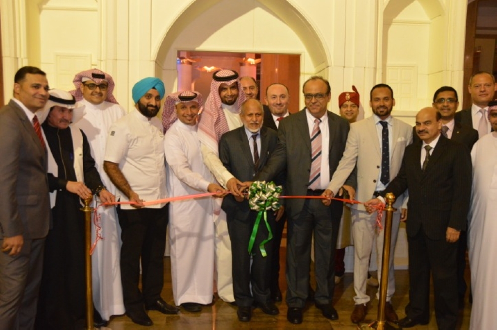 


Dr. Noorul Hasan, Consul commerce at the Indian Consulate in Jeddah, cuts the ceremonial  ribbon